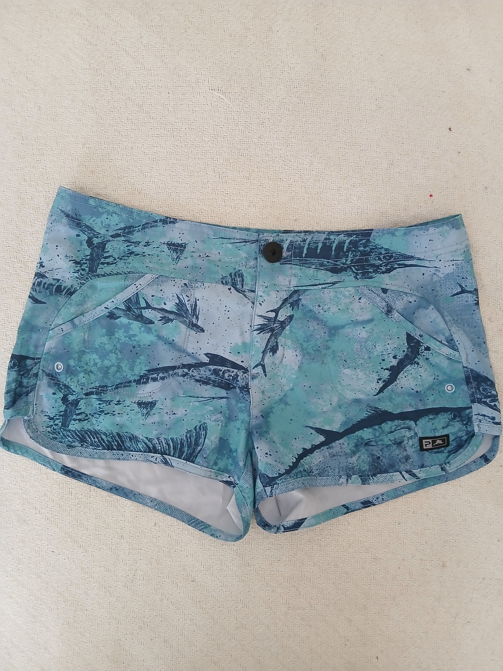 Pelagic Aqua Blue Printed Athletic Swim Shorts